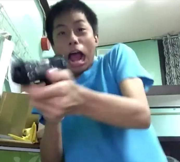 Dude gets scared and shoots the TV screen  meme template