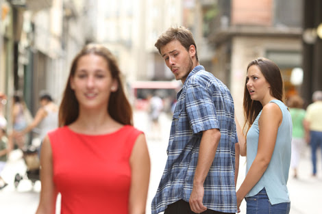 Guy checks out red dress girl meme template