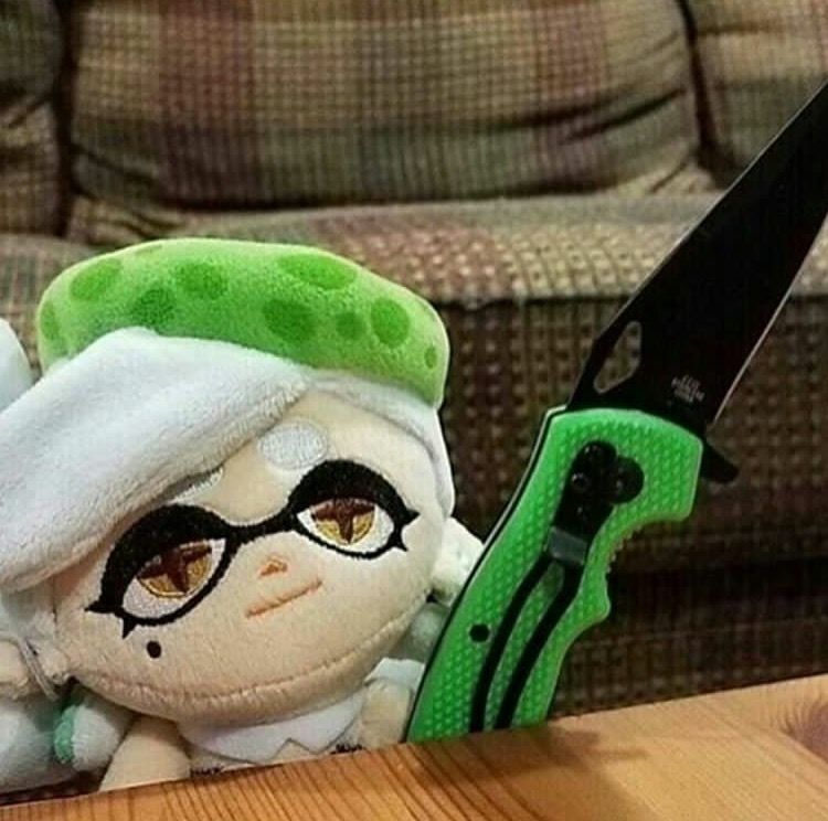 Marie plush with a knife  meme template